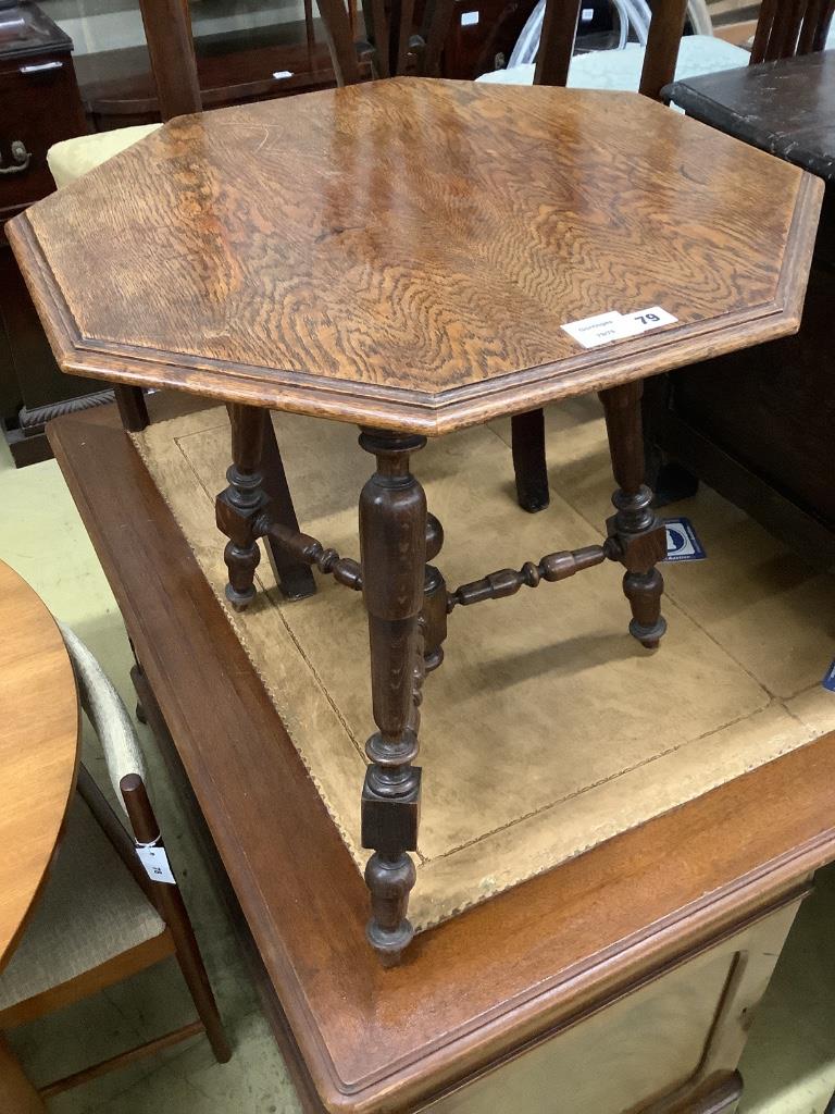 An Edwardian octagonal oak occasional table, width 60cm depth 62cm